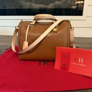 Carolina Herrera Andy 7 with gold lock.